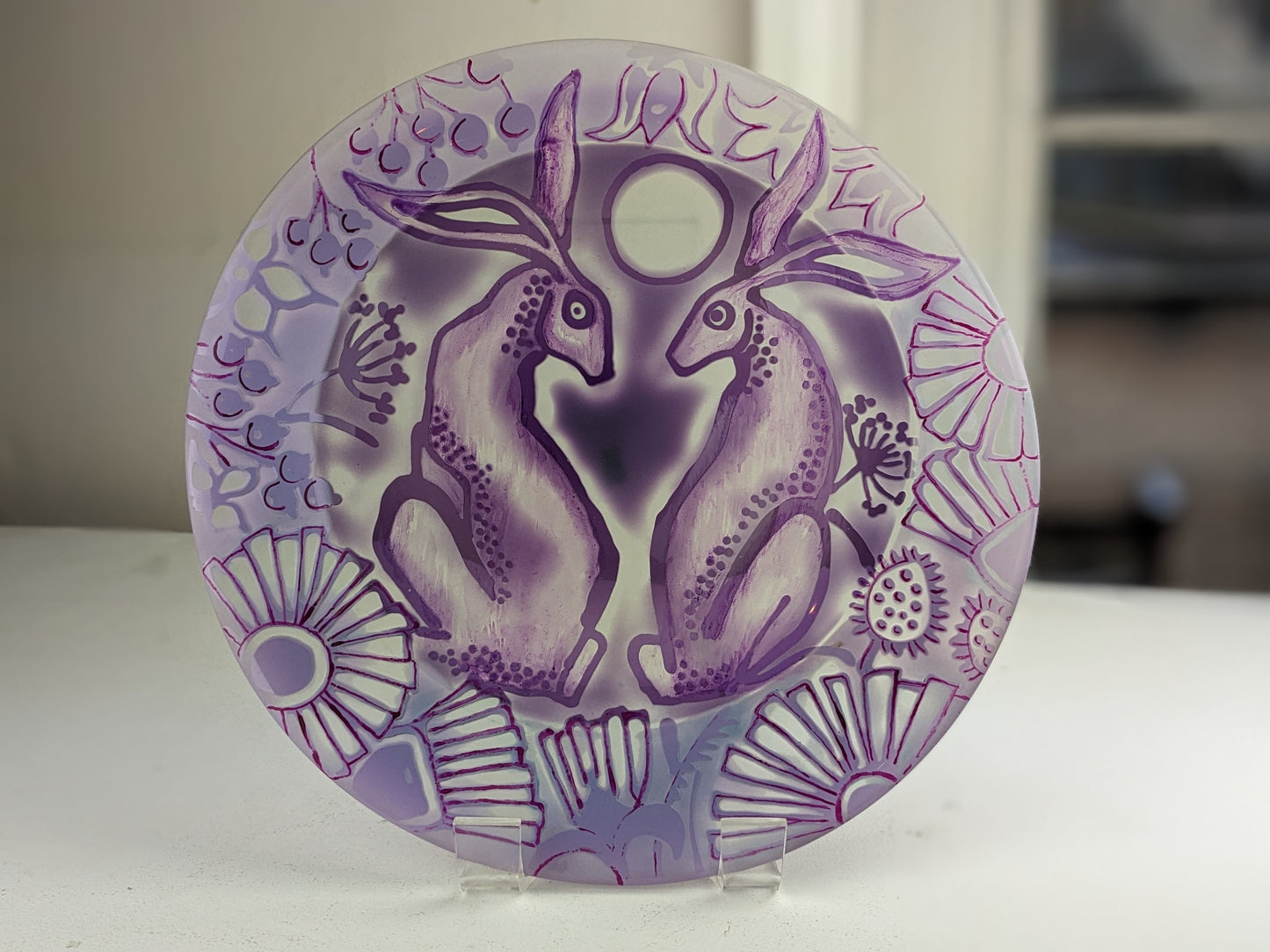 Burke, Margaret - Lavender hares in the meadow plate